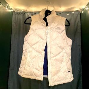 North face puffy white vest with navy blue inter